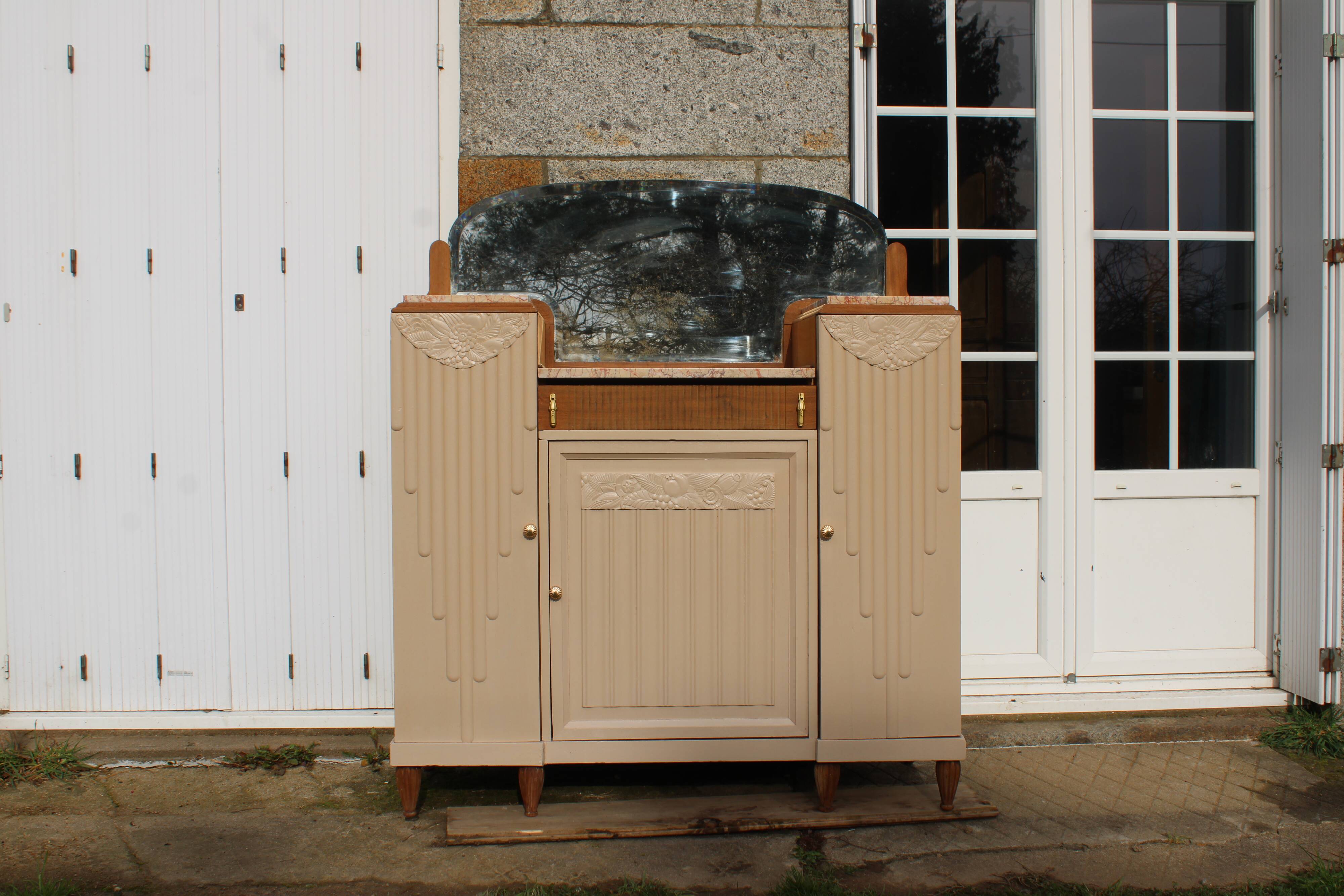 Renovated Art Deco buffet, pink marble and original mirror.