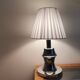 Mid Century Modern chromed table lamp with white pleated shade