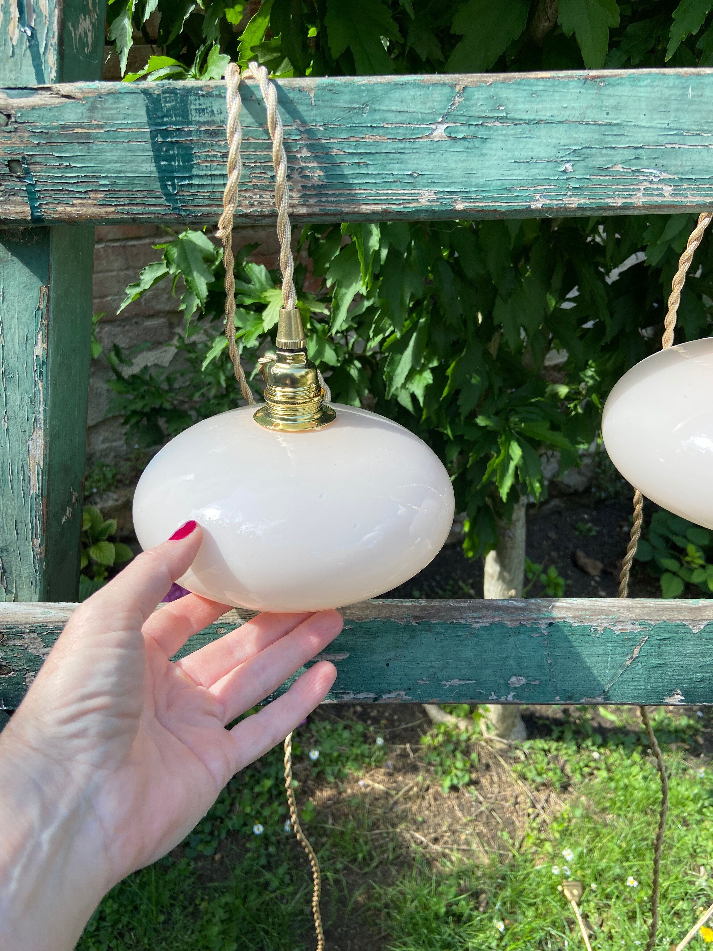 Vintage powder pink opaline globe player 1950