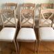 Set of 6 cross-back chairs in solid wood, with white boucle seats.