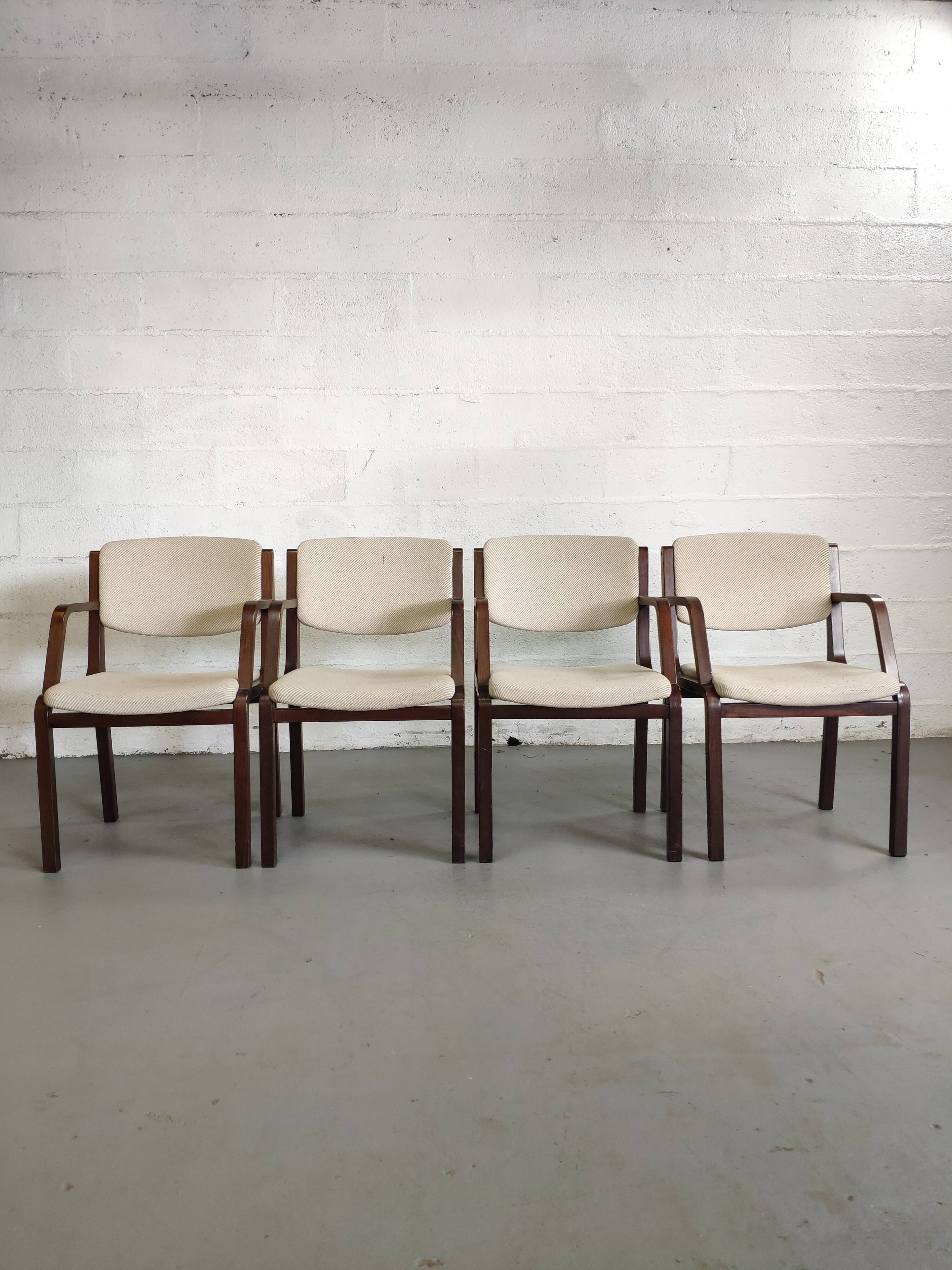 4 wooden and fabric chairs