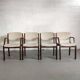 4 wooden and fabric chairs