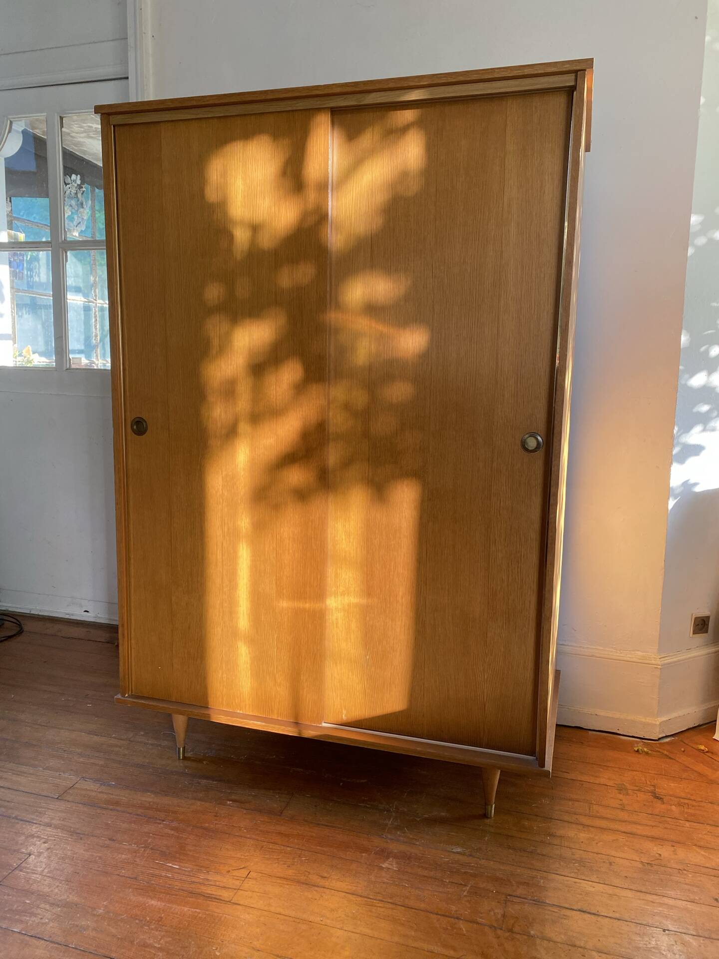 Large vintage Scandinavian wardrobe with two sliding doors.