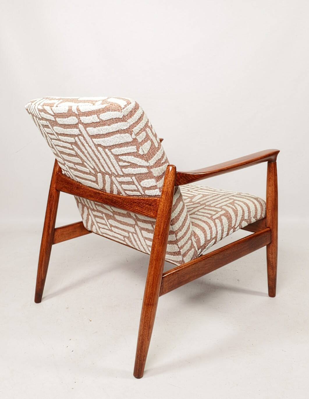 Mid-century modern armchair in coral red jacquard by E. Homa