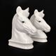 Pair of vintage white ceramic weighted horse bookends. 80 years