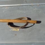 Pair of wooden skis and poles for children