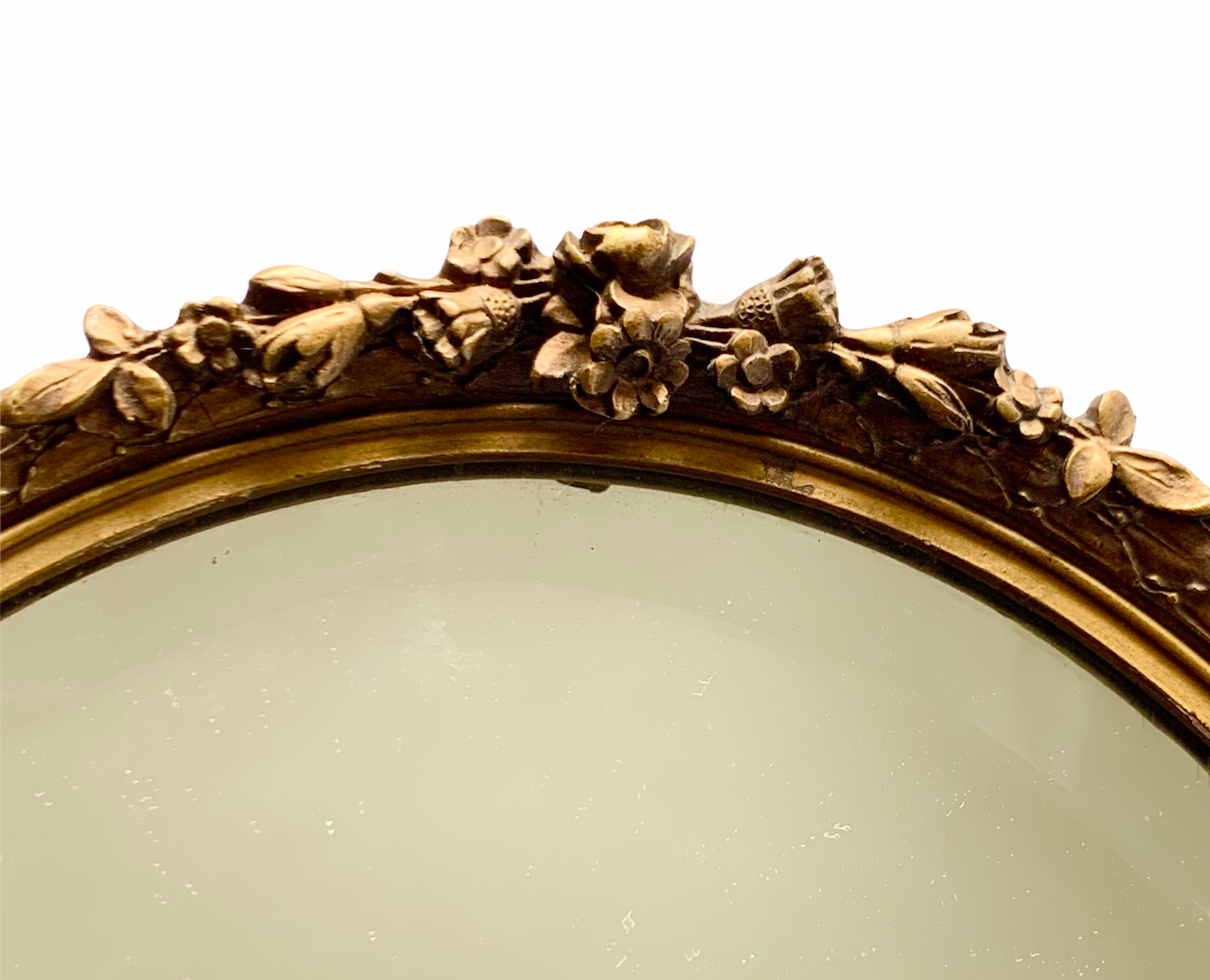 Oval mirror with flower garlands  31x45cm