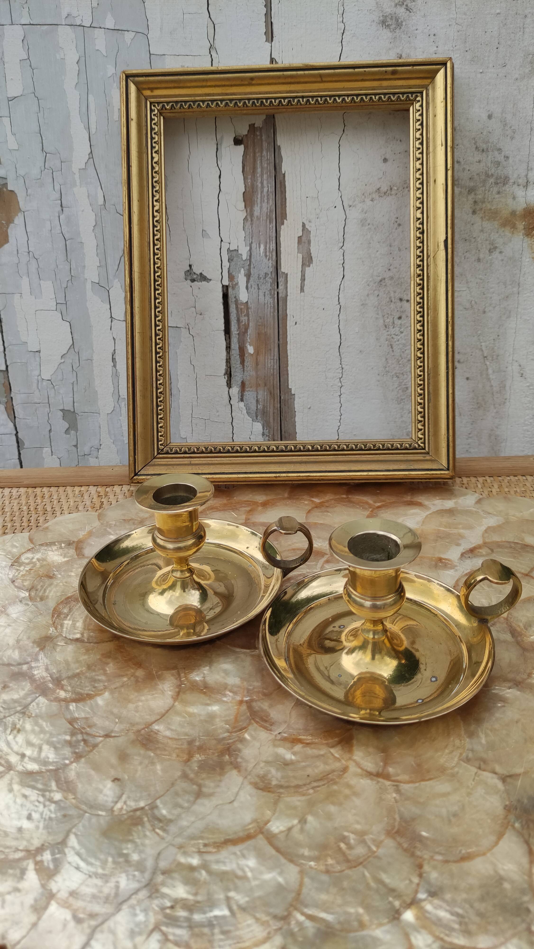 Pair of antique solid brass candle holders