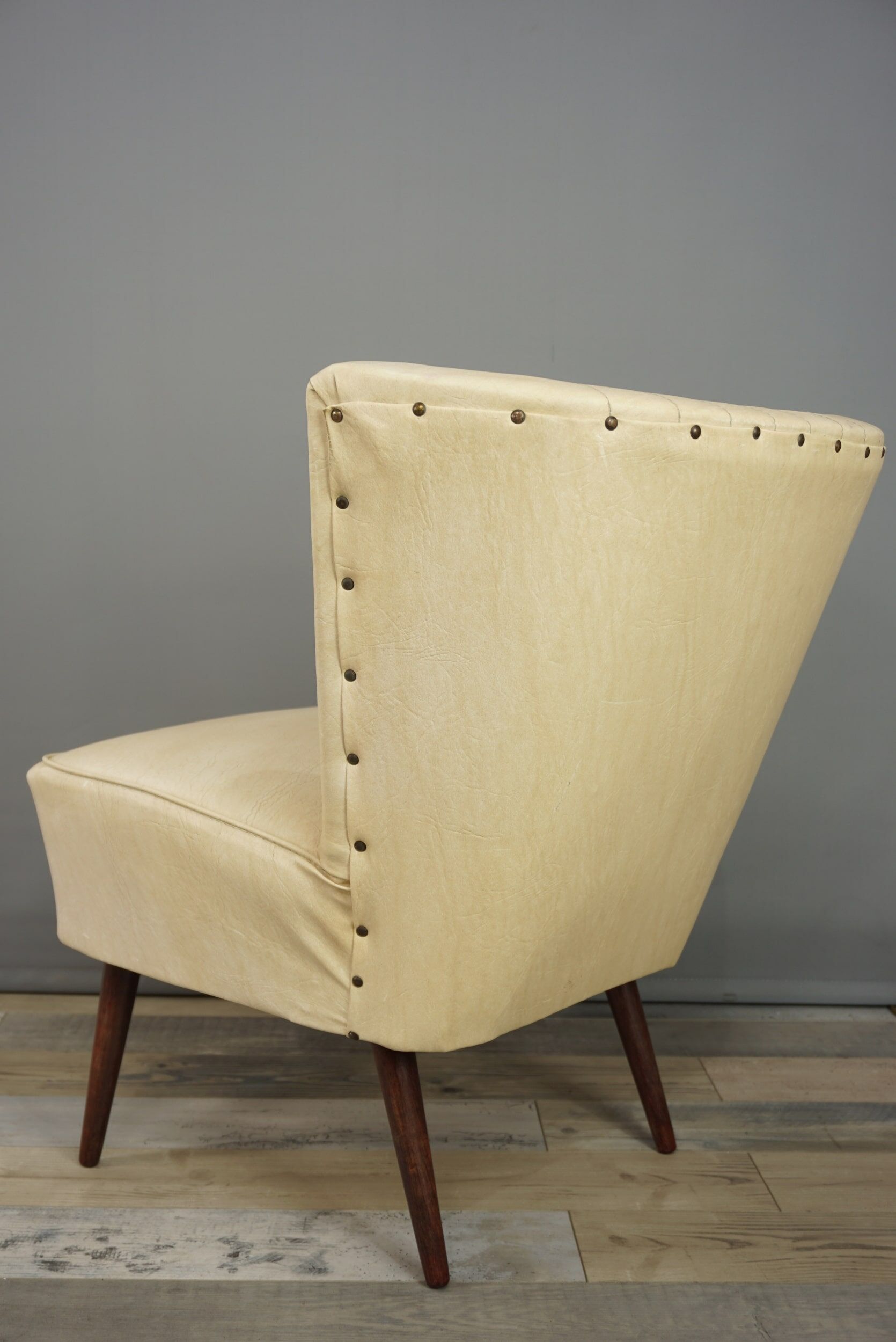 Cocktail armchair 50s in wood and imitation leather