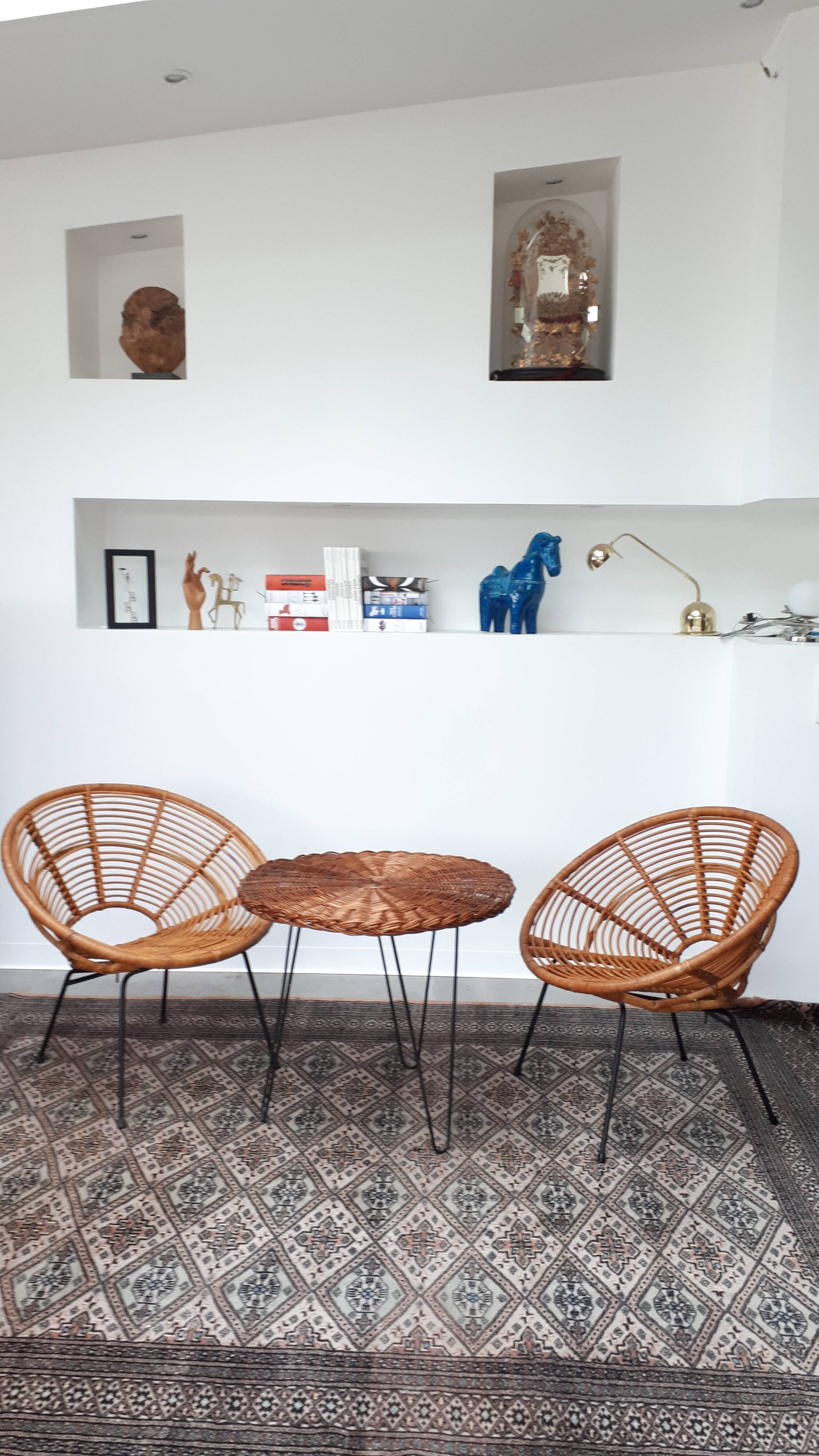 Set of armchairs "soleil" and rattan table of the years 50
