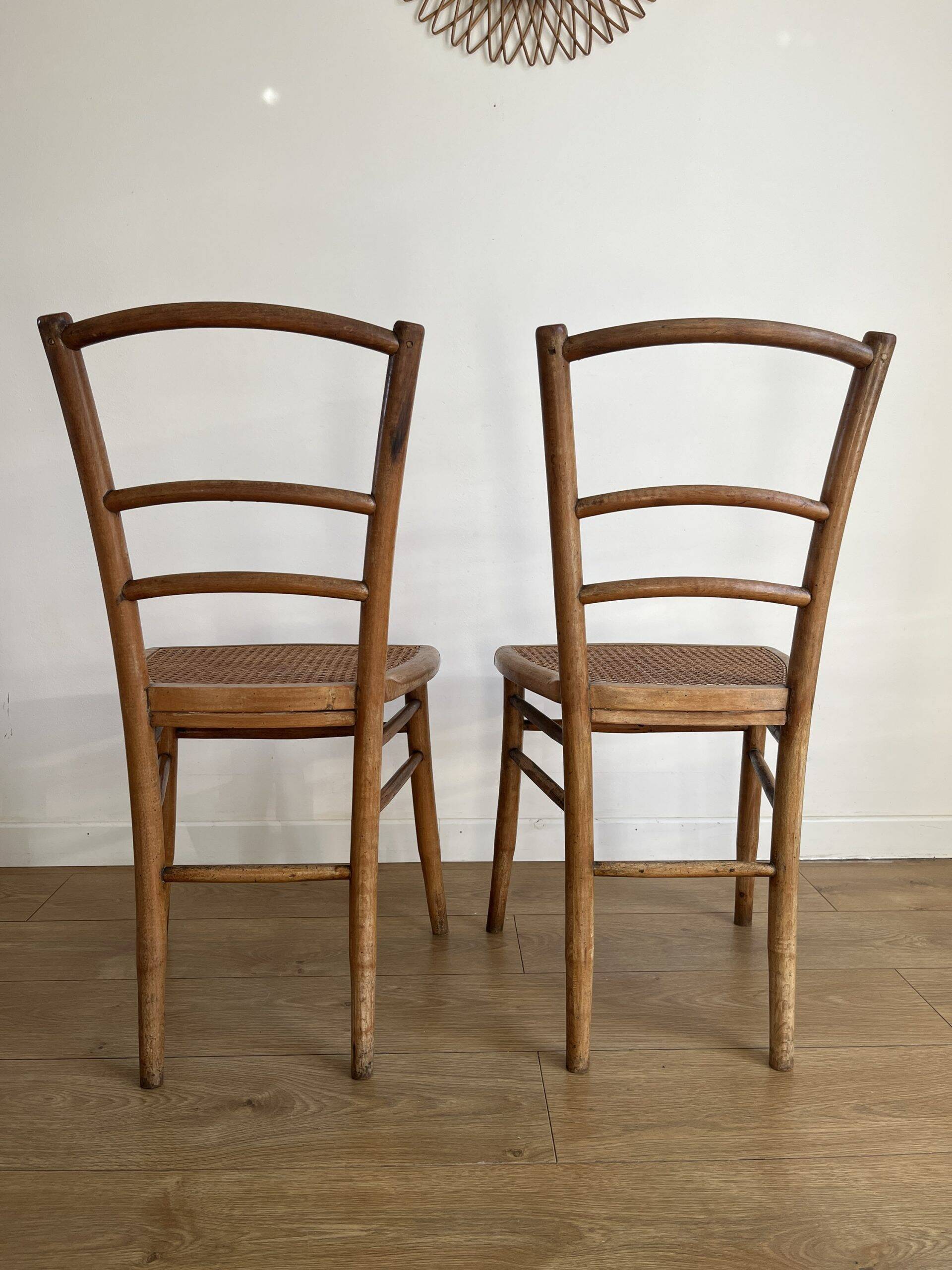 Pair of caned bistro chairs