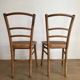Pair of caned bistro chairs
