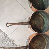 Set of 7 copper pans / brass handle