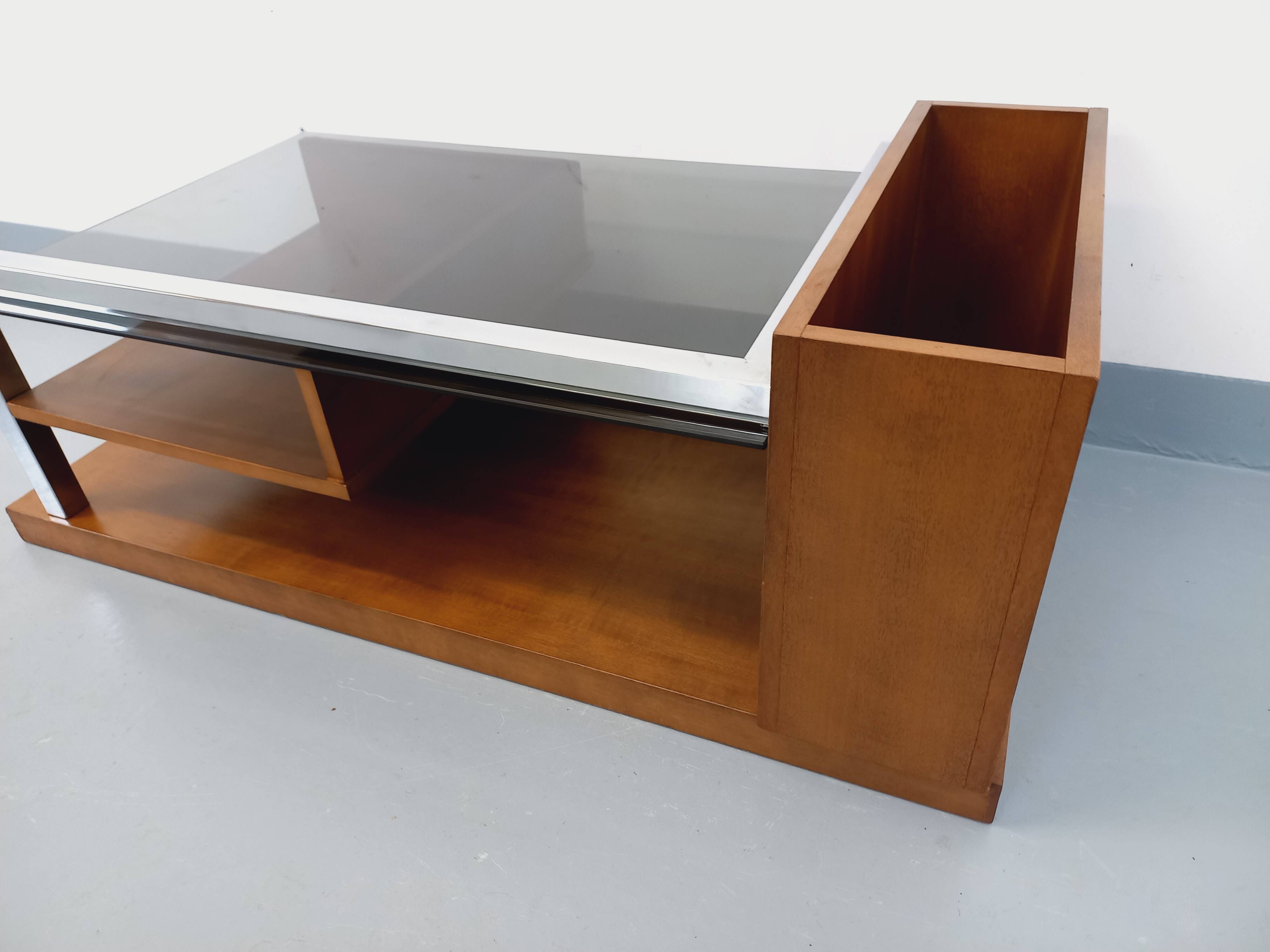 Rectangular vintage modernist coffee table with wooden niches, chrome.