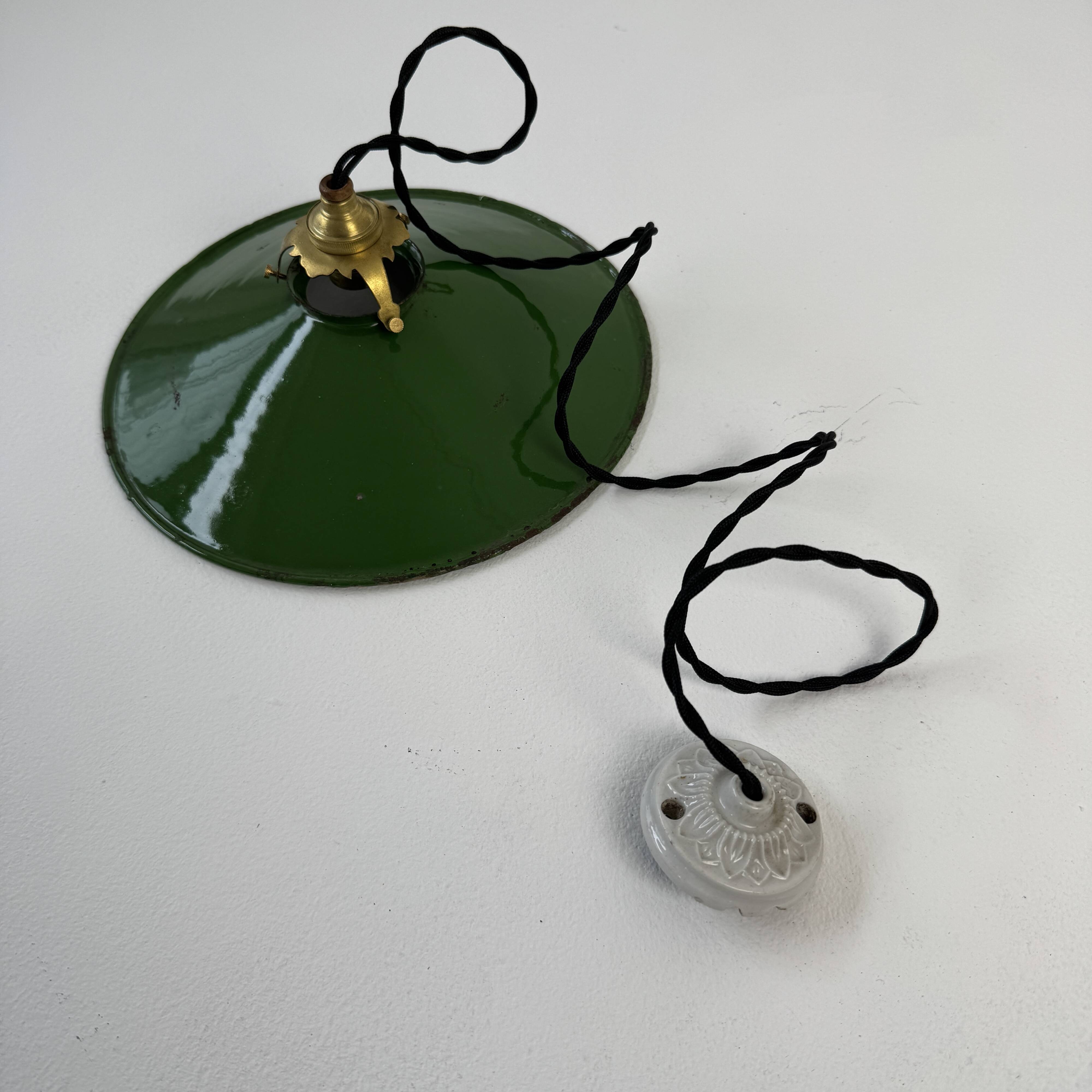 Old conical industrial pendant light in green enamelled sheet metal