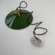 Old conical industrial pendant light in green enamelled sheet metal