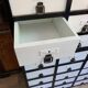 Large black and white industrial chest of drawers in pine, 40 drawers, 1950s.