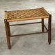 Mid Century wooden stool with a woven sisal seat