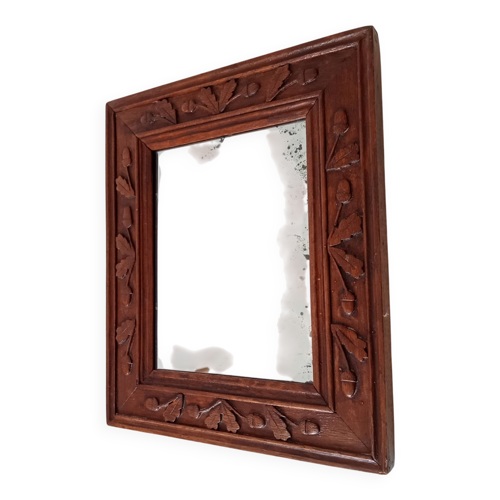 Antique mirror in carved wood