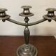 Pair of art deco style candle holders in silver metal