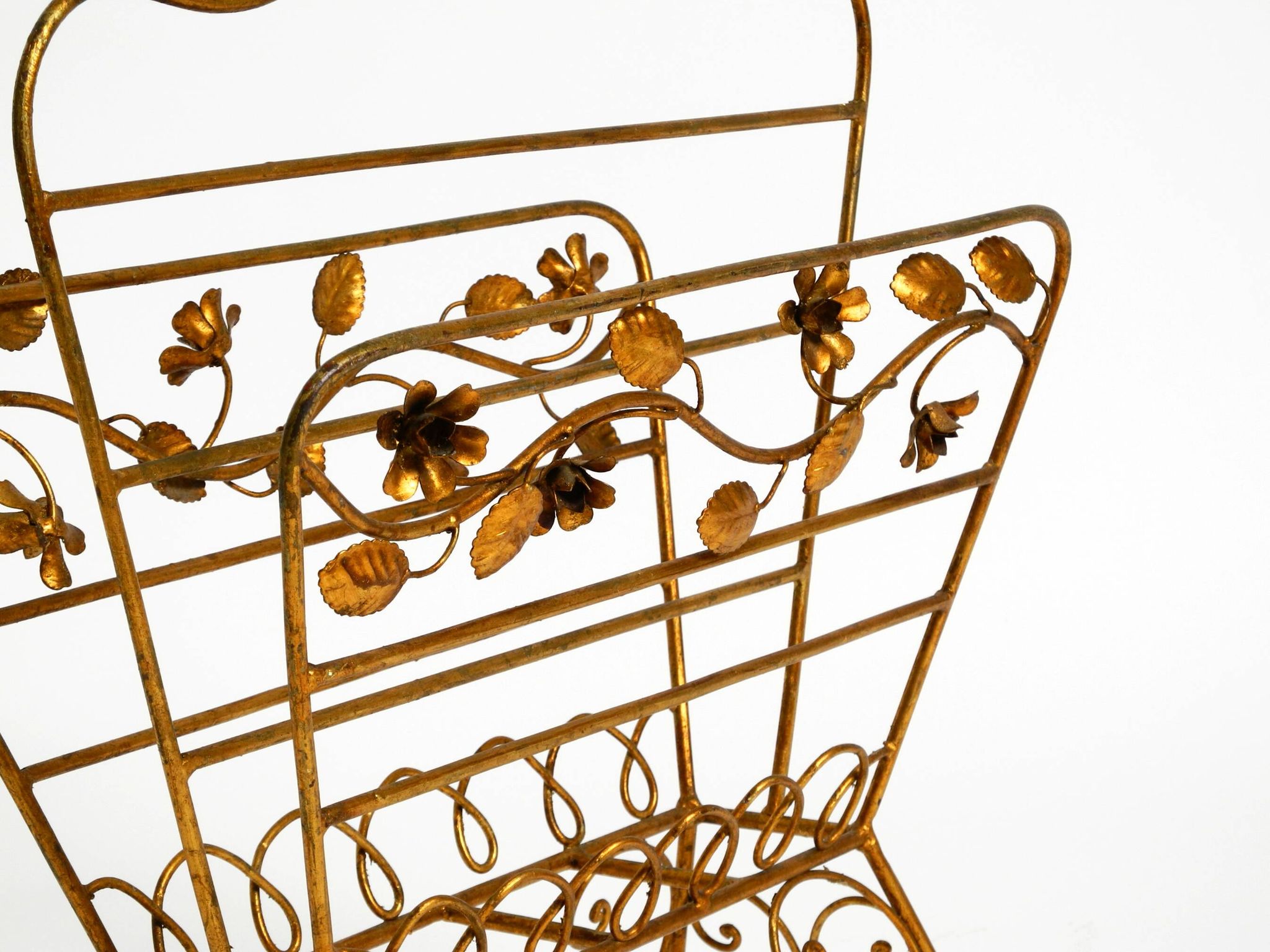 Extraordinary mid-century newspaper and magazine rack with a gilded metal
