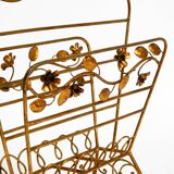 Extraordinary mid-century newspaper and magazine rack with a gilded metal