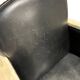 Pair of leather armchairs with marquetry armrests