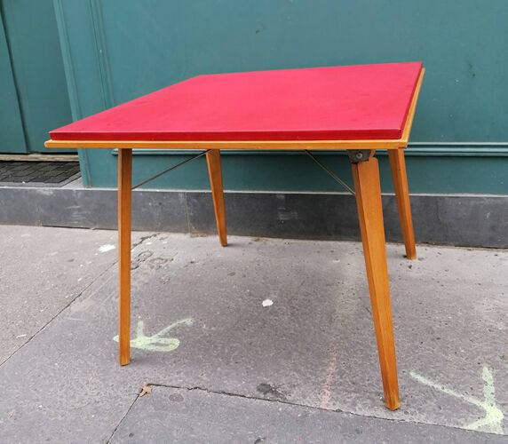 Table basse pliante bois, plateau vynil rouge, pieds compas, 1950