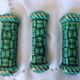 Set of 6 knife holders, a trivet, a 1960s bottle coaster