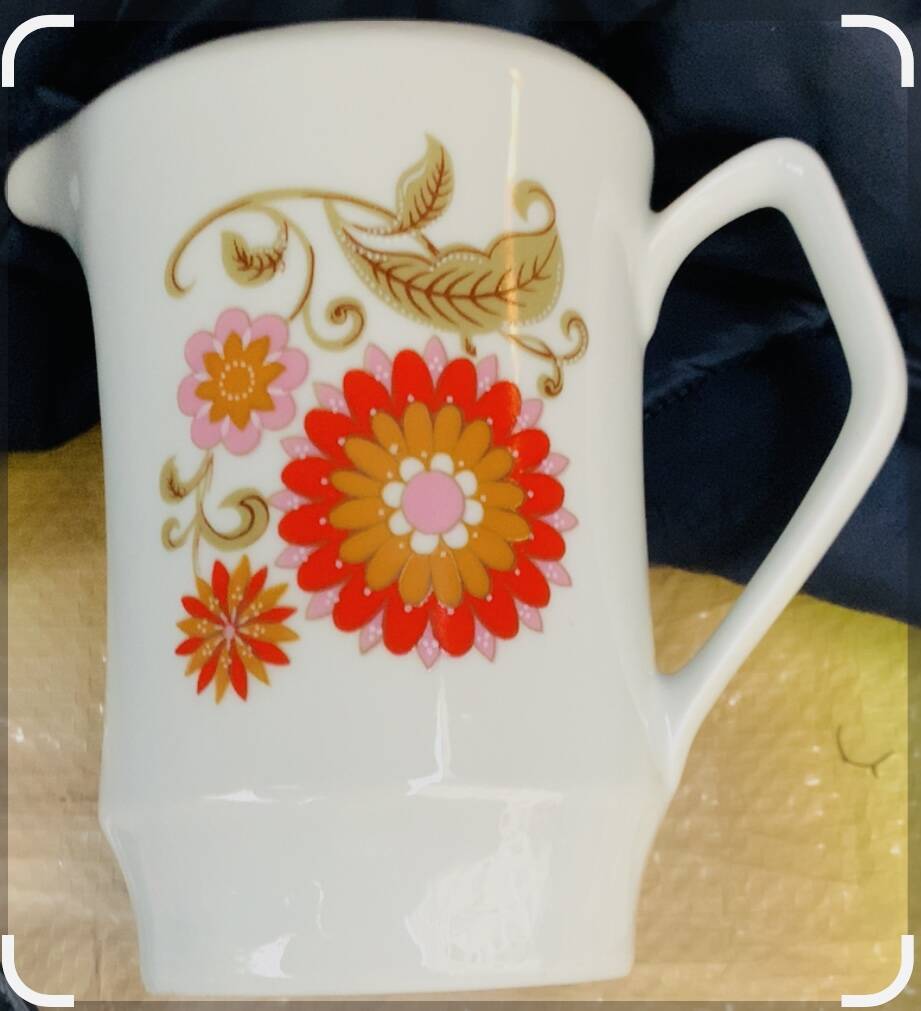 1970s orange floral pattern milk jug, Laura design