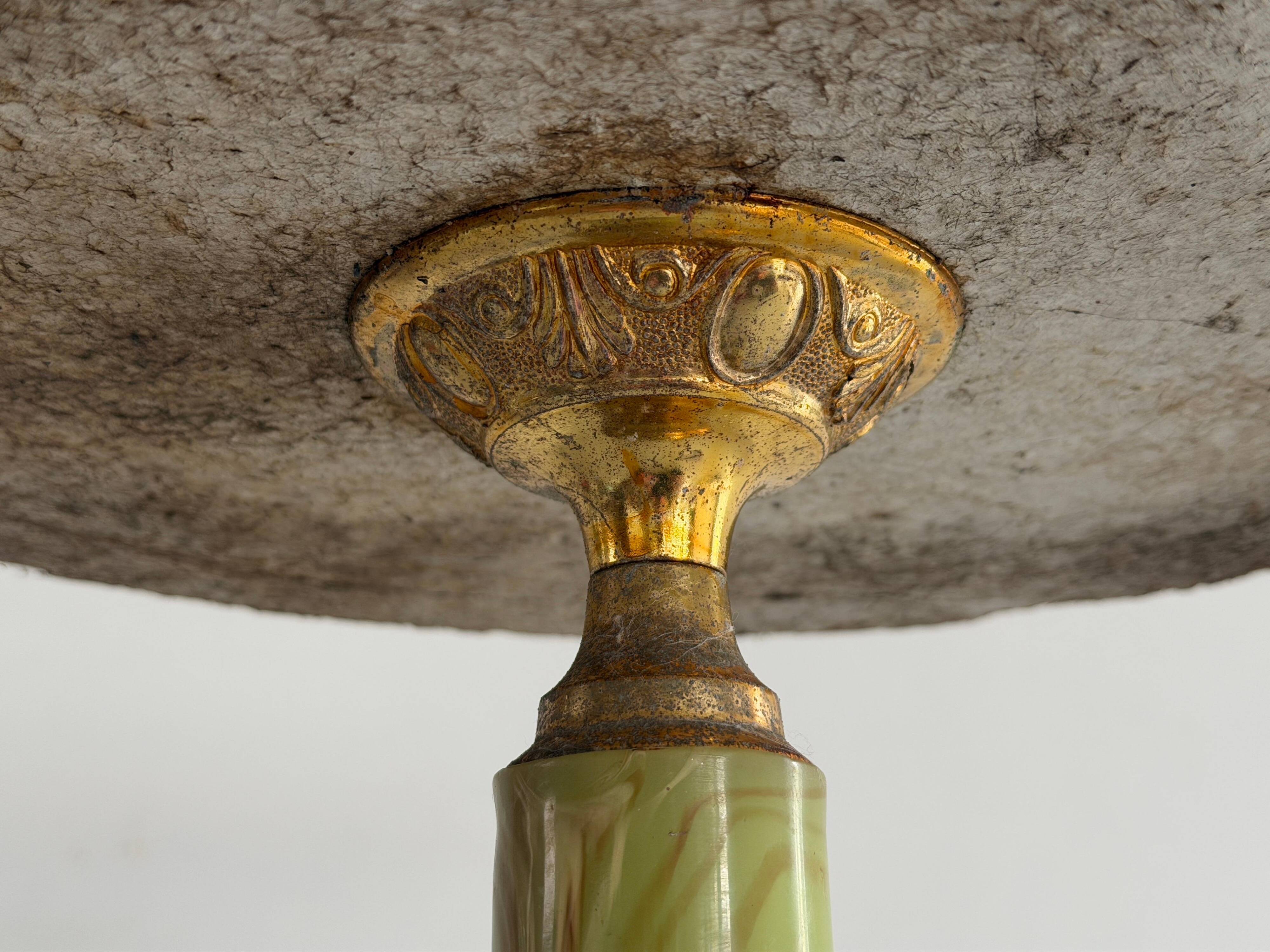 Mid-century side table in green marble with a brass base, 1960s, Italy.
