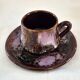 Six cups and saucers Vallauris glazed ceramic in brown and old pink.