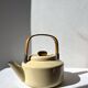 Vintage enamelled metal kettle in beige, Copco style.