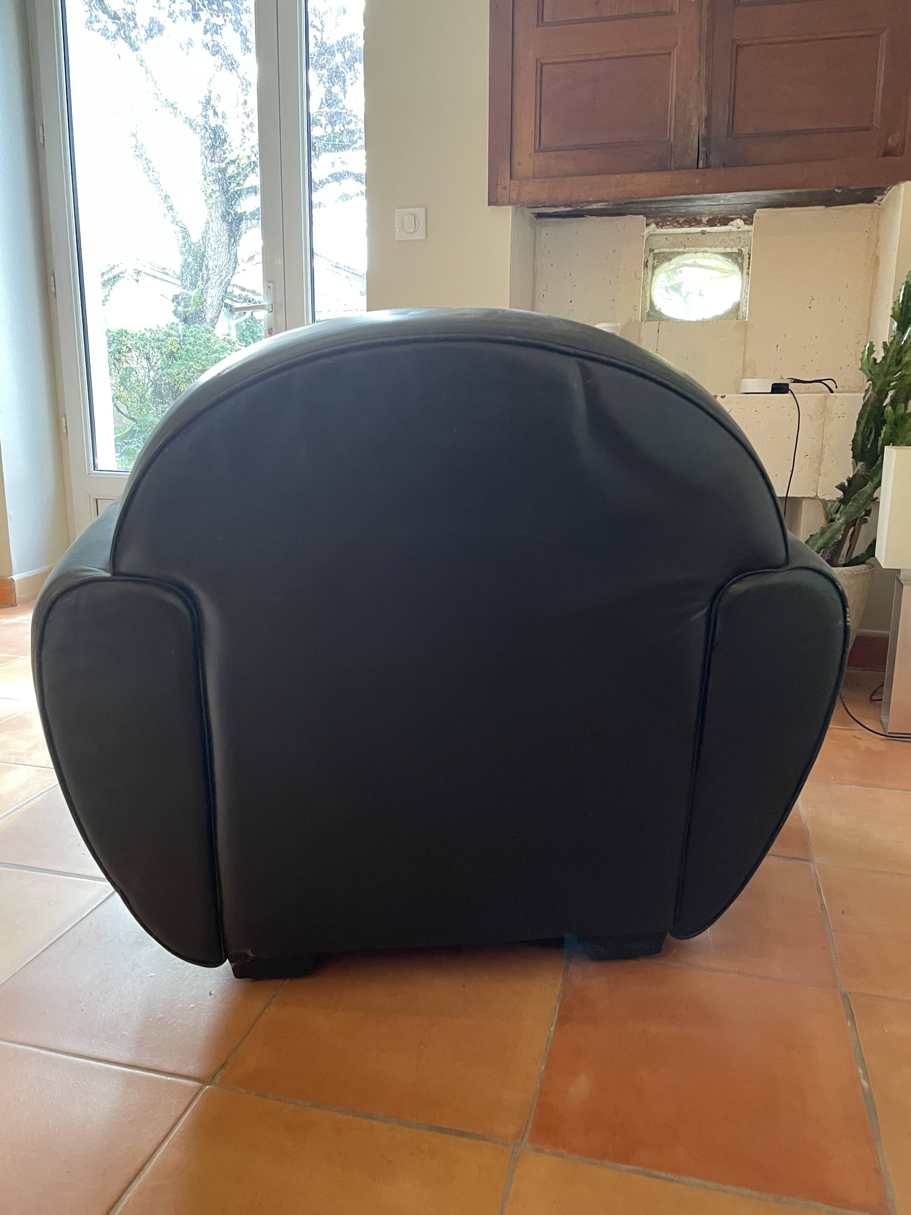 Green leather club chairs