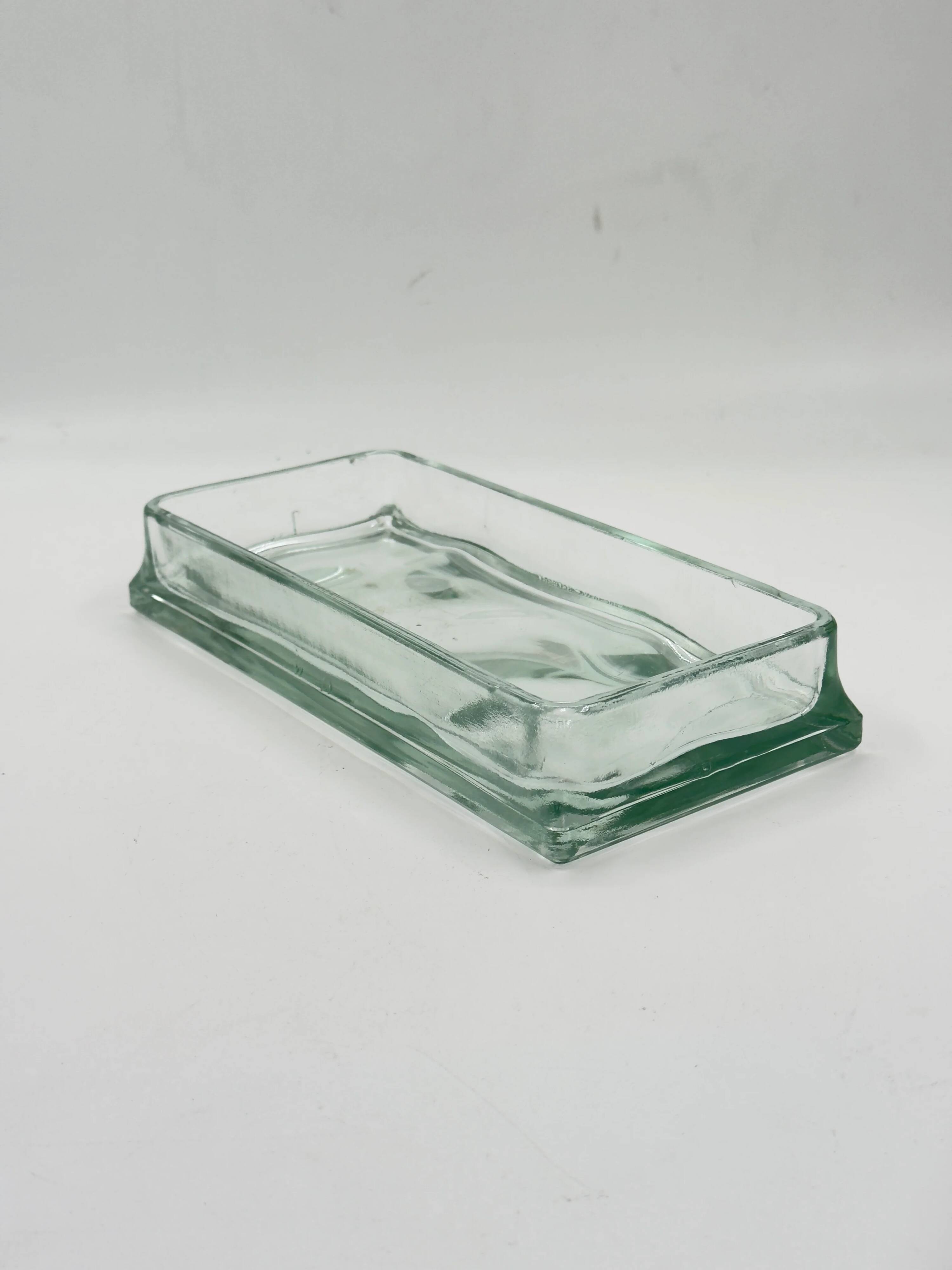 Vintage rectangular plateau in thick pale green glass.