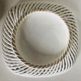 Covered basket in woven ceramic and fruit slip.