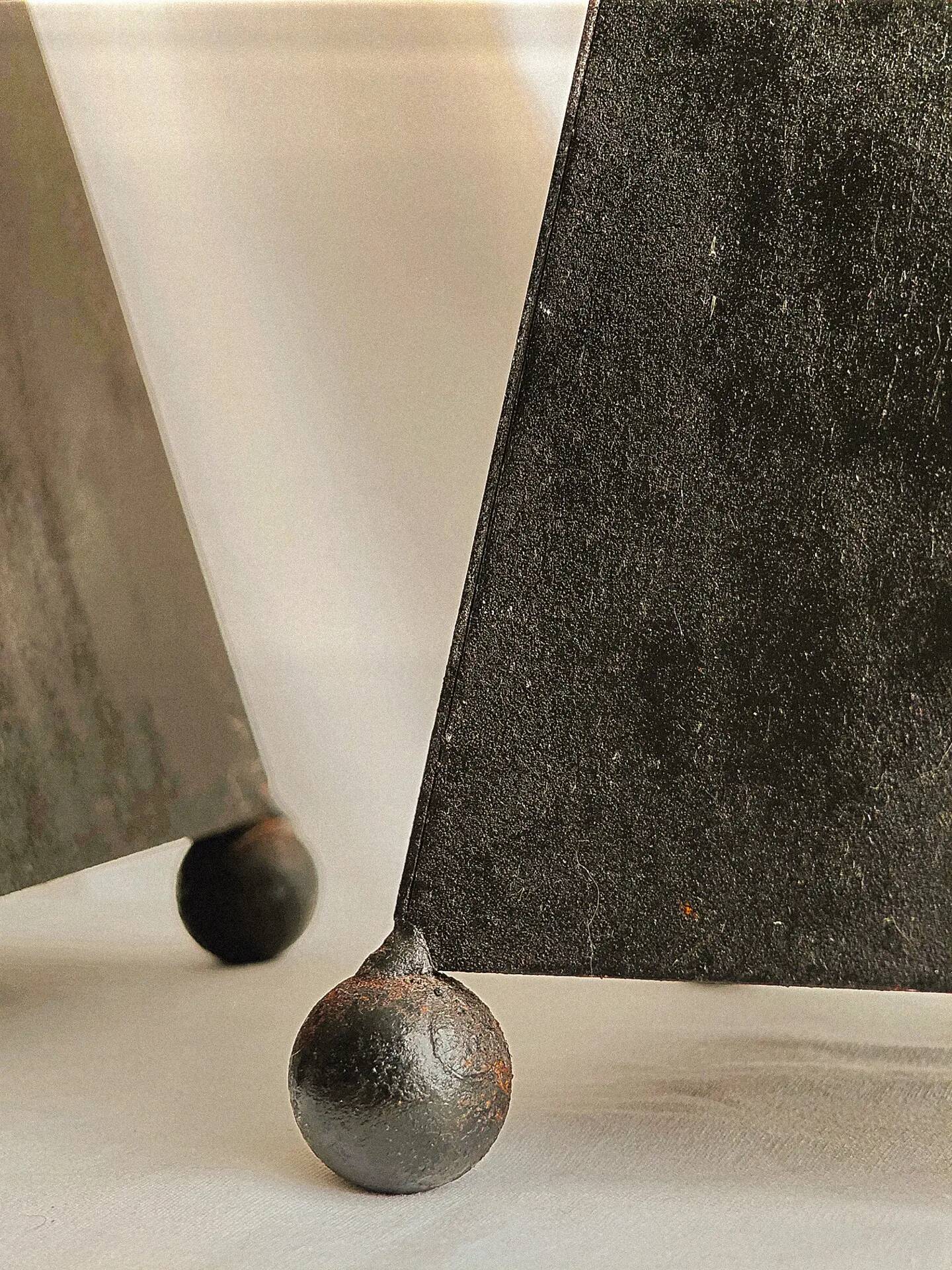 Pair of pyramid-shaped candlesticks in blackened metal (brutalism)