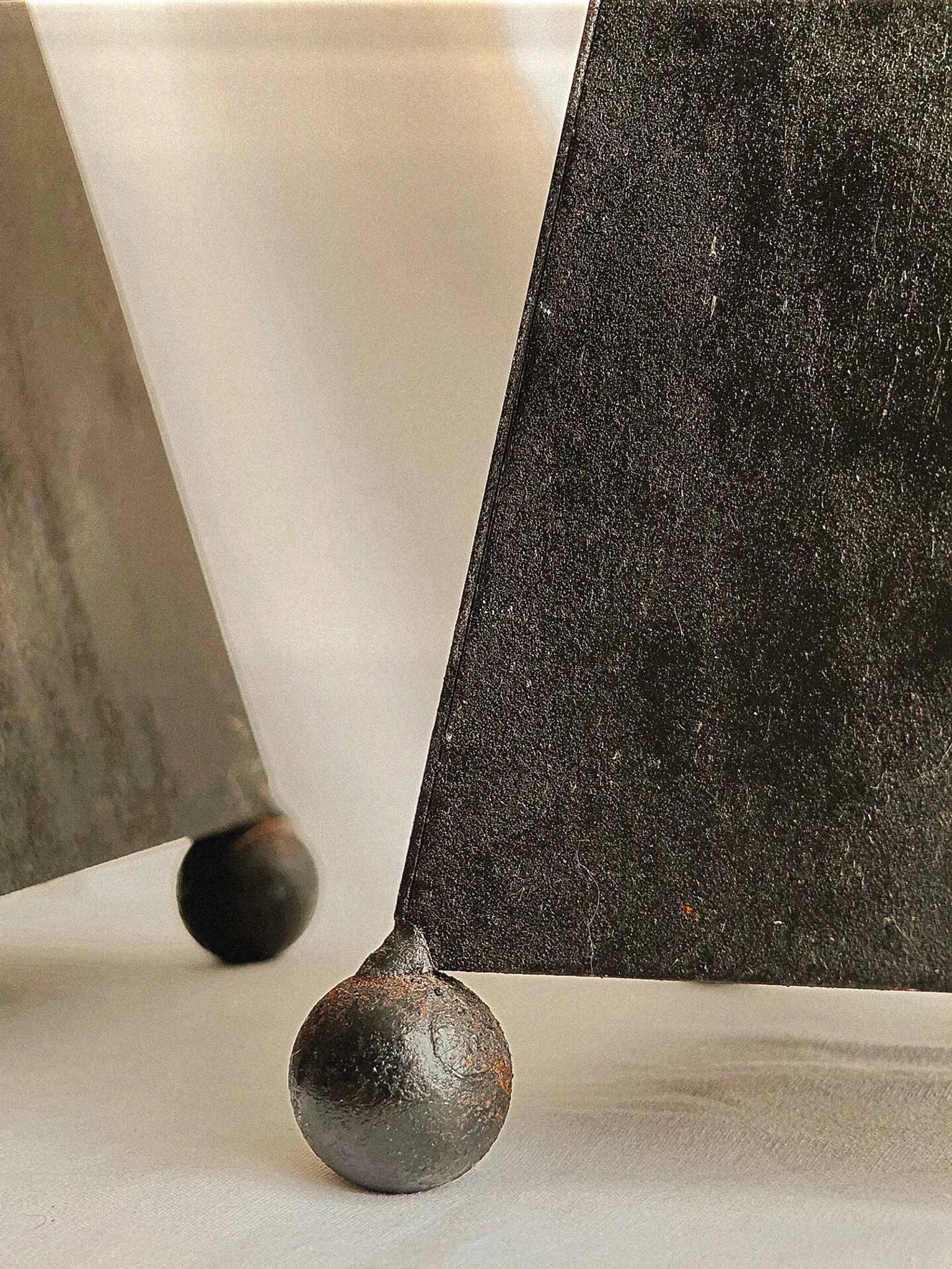 Pair of pyramid-shaped candlesticks in blackened metal (brutalism)