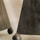 Pair of pyramid-shaped candlesticks in blackened metal (brutalism)