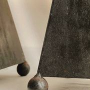 Pair of pyramid-shaped candlesticks in blackened metal (brutalism)