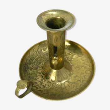 Brass candlestick with rise and fall