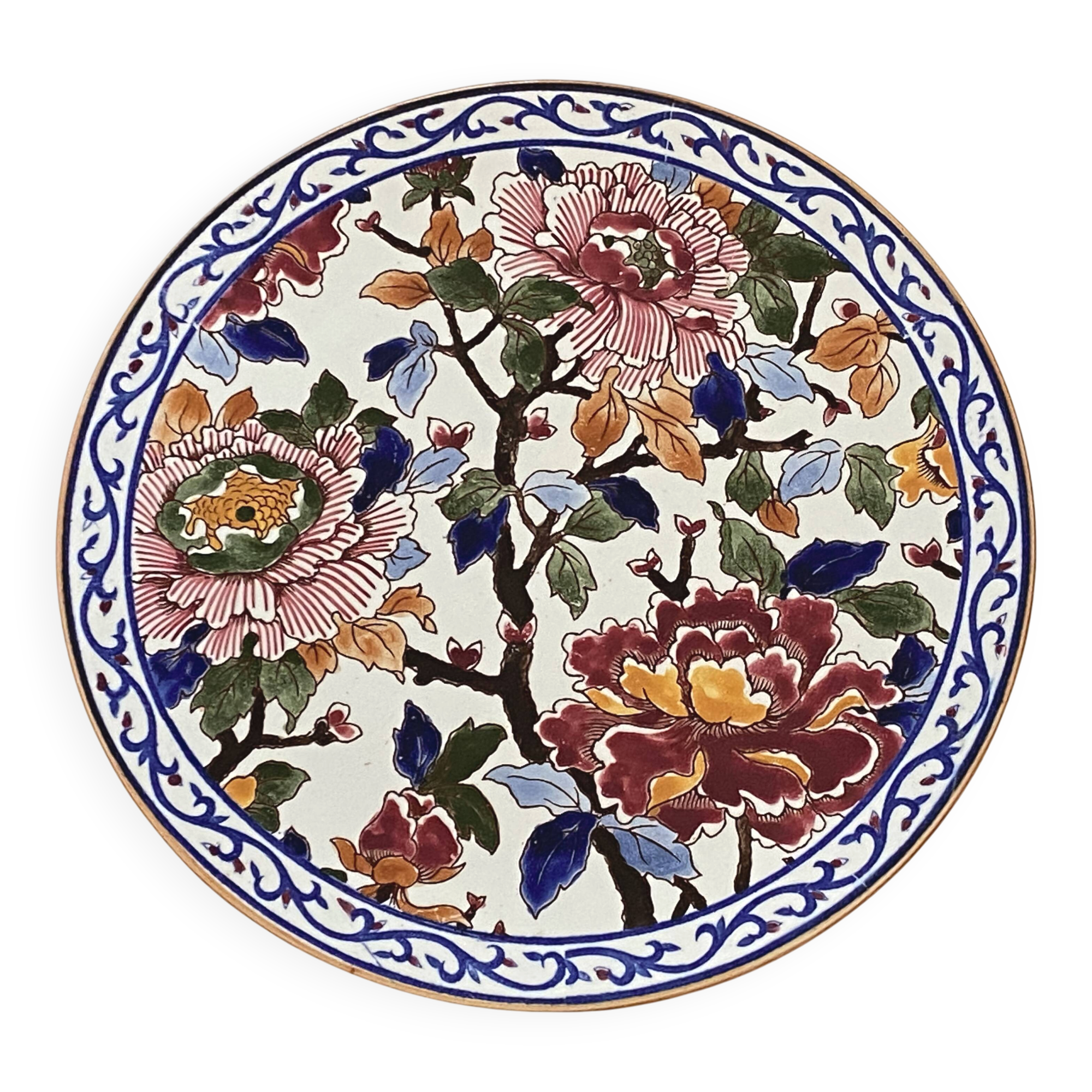 Round plate in Gien earthenware model Peonies