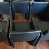 6 faux leather chairs on wheels