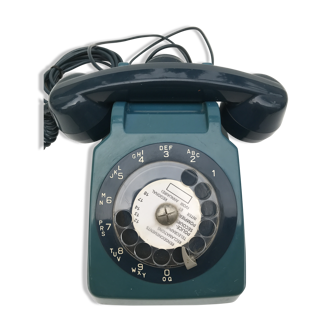 Ancien téléphone fixe à cadran bleu vintage