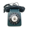 Ancien téléphone fixe à cadran bleu vintage