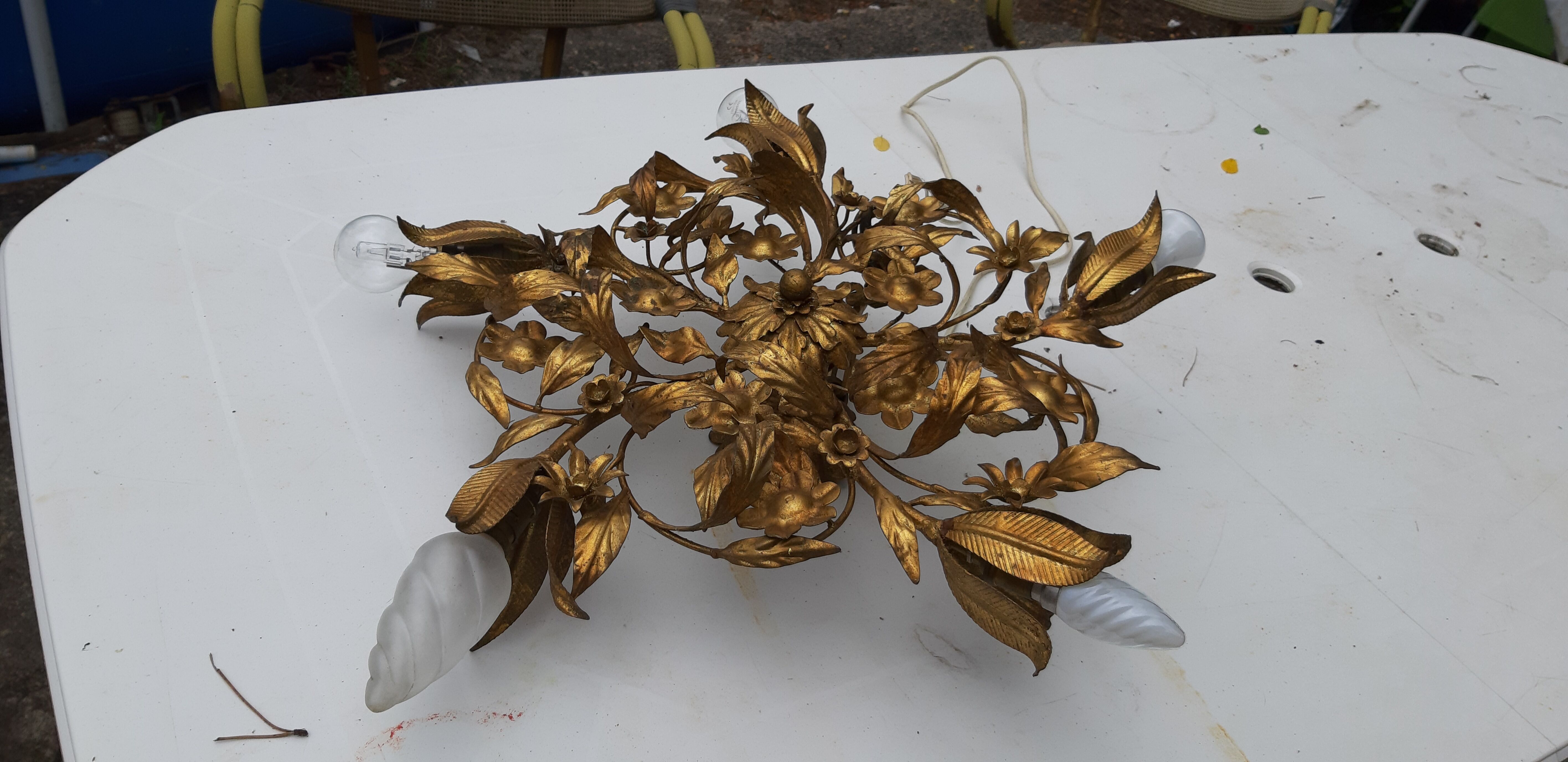 Vintage chandelier in gilded metal