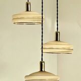 Triple cascade pendant light with vintage frosted glass globes and gold finish