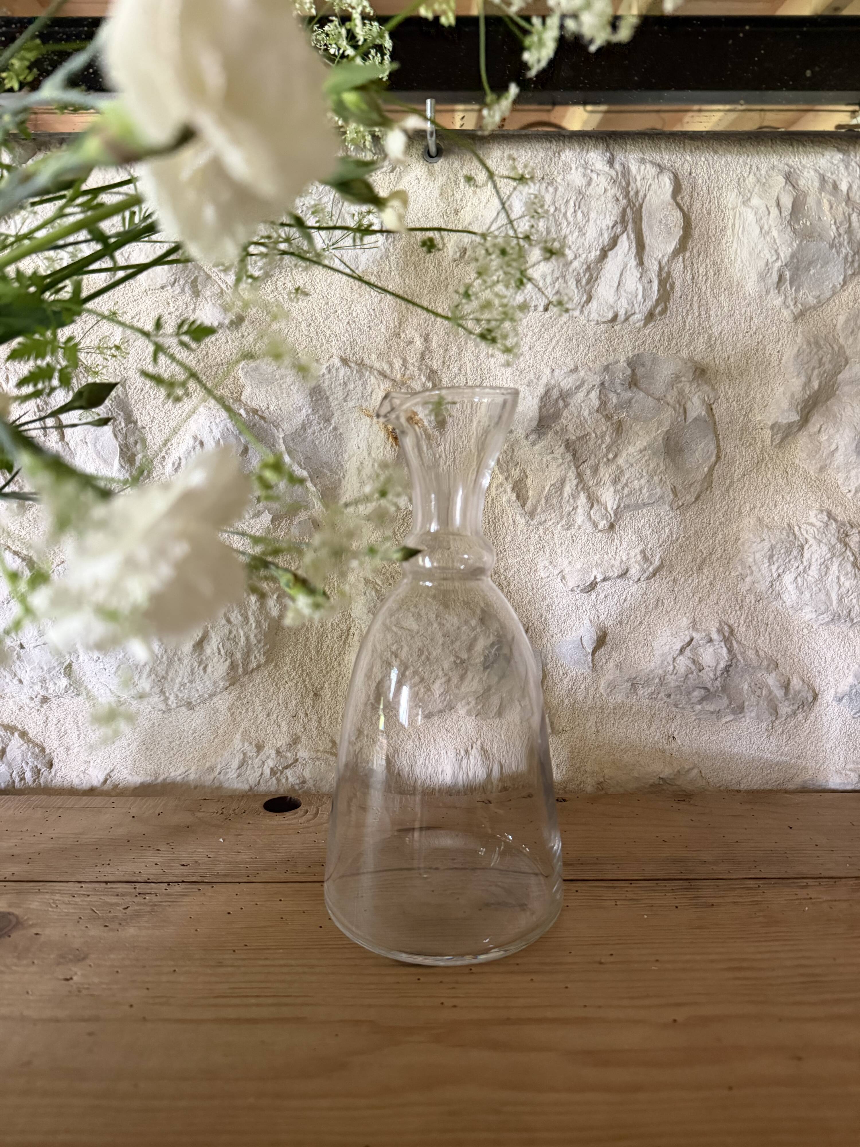 Antique glass pouring jug