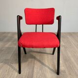 Red fabric chair with black base