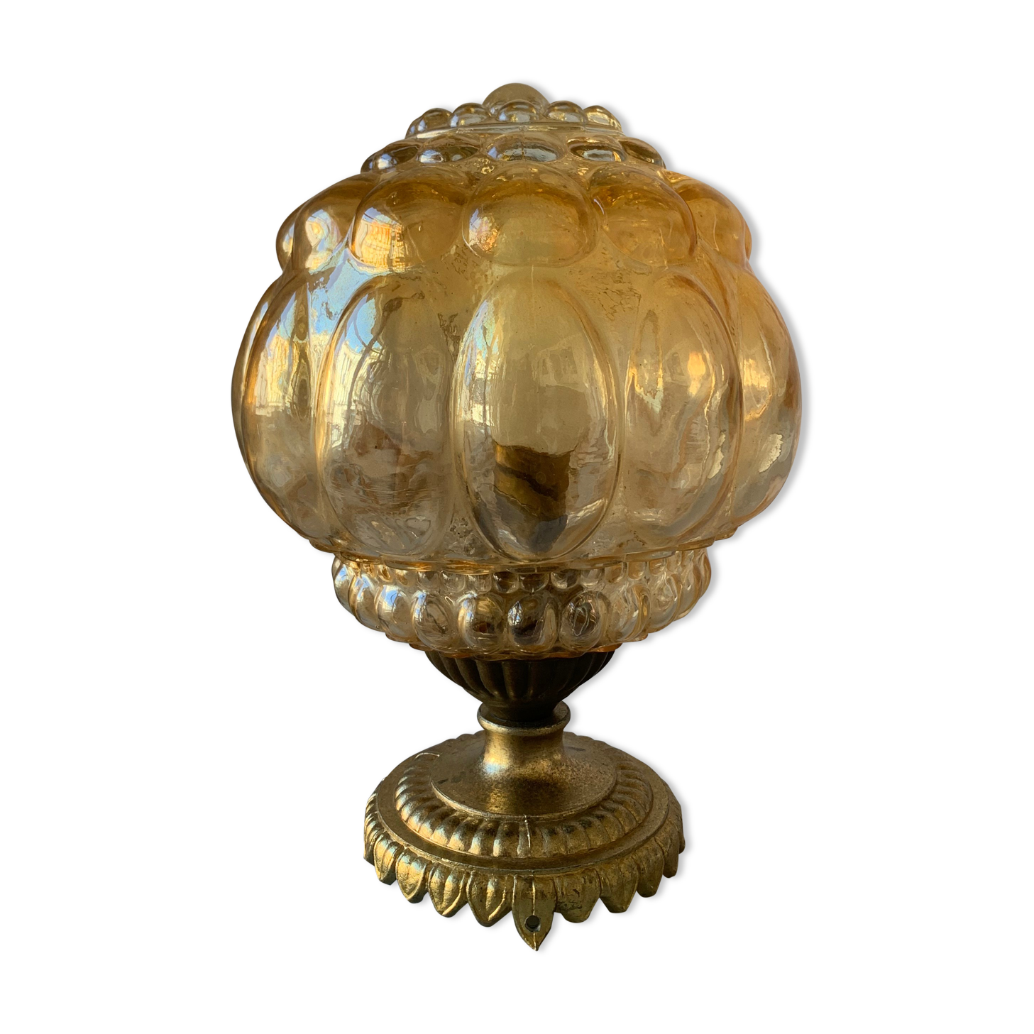 Old vintage table lamp made of amber molded glass